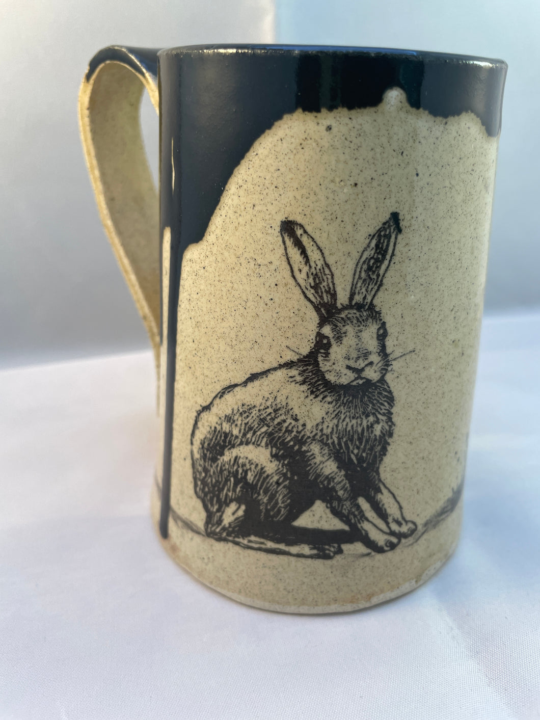Rabbit, Butterfly, and Grain ArtPrize Mug - black