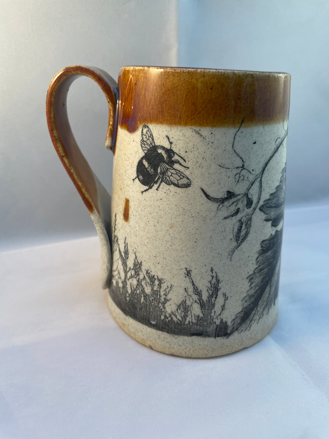 Squash, Bumblebee, and Grasshopper ArtPrize Mug - floating orange