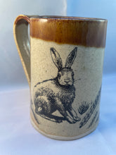 Load image into Gallery viewer, Rabbit and Grain ArtPrize Mug - floating orange
