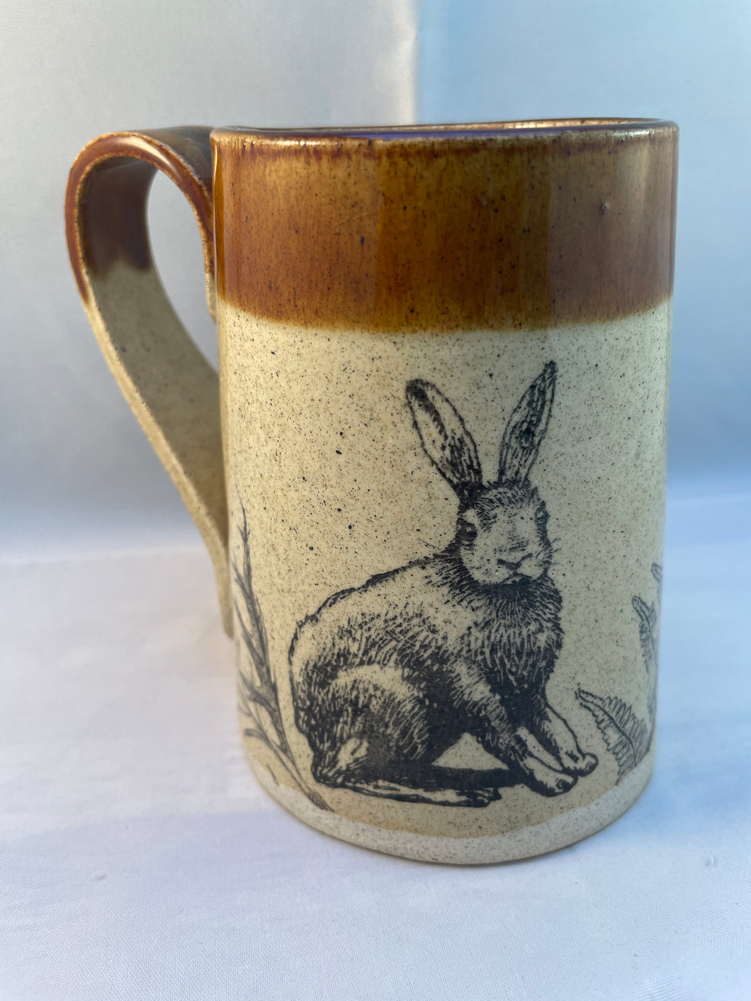 Rabbit, Fern, and Acorn ArtPrize Mug - floating orange