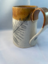 Load image into Gallery viewer, Squirrel, Leaf, and Paw Print ArtPrize Mug - amber
